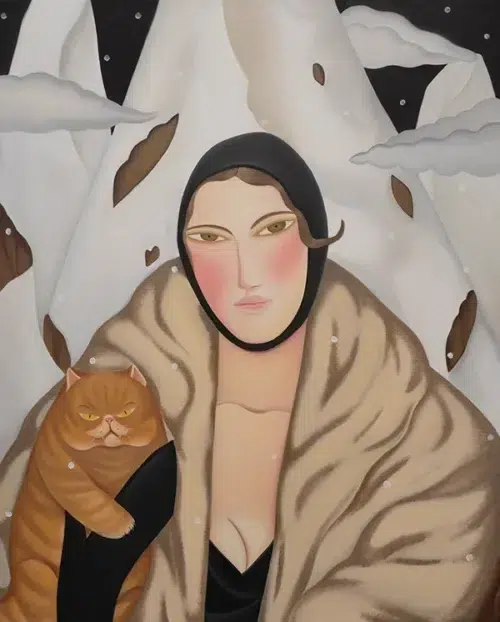 Lady in the mountains with ginger cat
