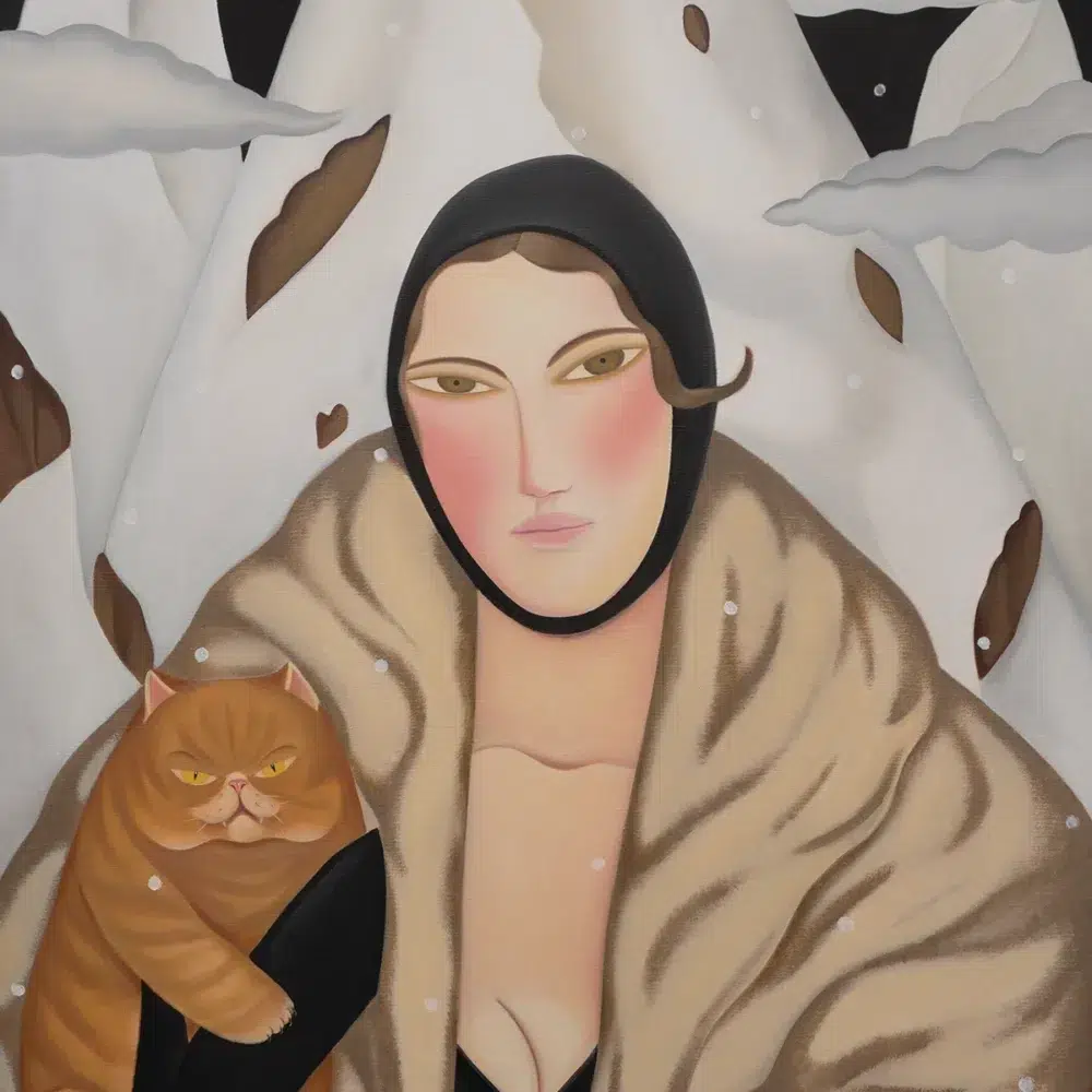 Lady in the mountains with ginger cat